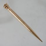 An early 20th century 9 carat gold propelling pencil,