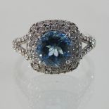A blue topaz and gem set ring