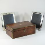 A pair of silver plated picture frames, together with a Victorian rosewood writing slope,