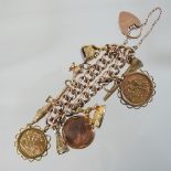 A 9 carat gold charm bracelet, suspended with various novelty charms,
