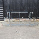 A graduated iron plant stand, in three sections,