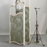 A 19th century cream painted folding dressing screen,