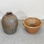 A terracotta olive jar, together with a pot,