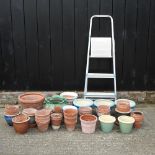 A collection of various garden pots,