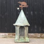 A verdigris garden weather vane,