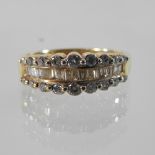 A 14 carat gold three row diamond ring, approx 1.