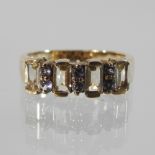 A 9 carat gold topaz ring,
