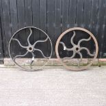 A pair of cast iron industrial wheels,