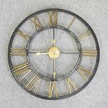 A metal framed wall clock,