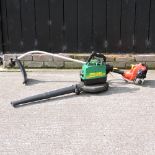 A Homelite petrol strimmer,