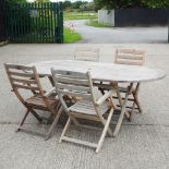 A teak garden table, 202 x 101cm,