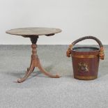 An early 20th century oak occasional table, on a tripod base, 57cm,