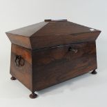 A large William IV rosewood tea caddy, of sarcophagus shape,