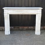 A carved marble fire surround,