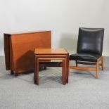 A nest of three G-Plan teak occasional tables, largest 53cm,