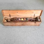 A part croquet set, in a wooden box,