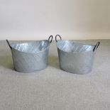 A pair of large oval garden planters,