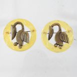 A pair of unusual early 20th century continental bakelite hair clips,