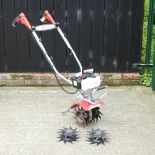 A Mantis model 7265 four-stroke garden tiller,