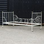 A Victorian white painted metal day bed,