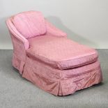 A Victorian style pink upholstered chaise longue,