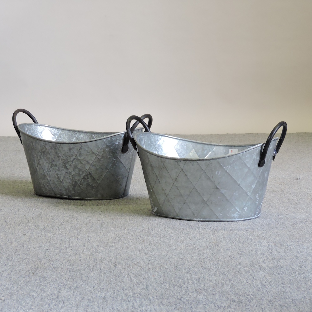 A pair of oval garden planters,