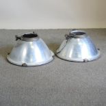 A pair of industrial ceiling lights,