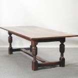 An 18th century style oak refectory table,