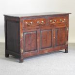 An 18th century style oak dresser base,