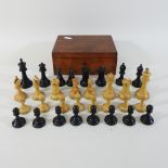 A carved wooden Staunton chess set, tallest 8cm,