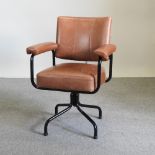 A mid 20th century brown leather upholstered and black tubular metal desk chair