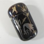 A 19th century Japanese tortoiseshell vesta case, inlaid with a crane, 6.