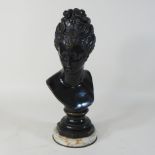 A bronze portrait bust,