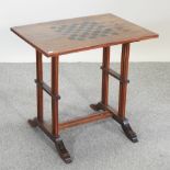 An early 20th century rosewood chess table,