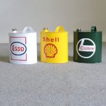 Three painted advertising petrol cans, to include Shell, Castrol and Esso,