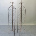 A pair of folding garden lattice spires,