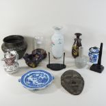 A Chinese porcelain vase, 31cm high, together with a shelf of oriental items,