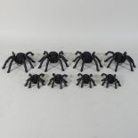 A set of eight cast iron models of spiders,