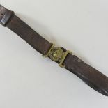 An early 20th century leather military belt,