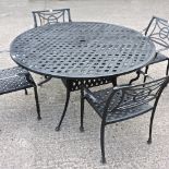 A black painted metal circular garden table, 153cm,