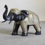 A model of an elephant, with mirrored decoration,