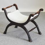A Regency style mahogany X frame footstool,