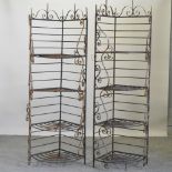 A pair of iron standing baker's racks,