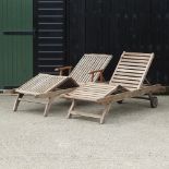 A teak sun lounger, 124cm long,