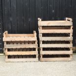 A collection of ten wooden fruit trays,