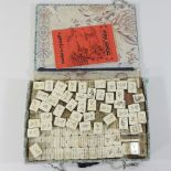 A vintage mahjong set,