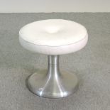 A 1960's white padded circular stool,