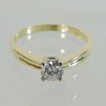 A bespoke made 14 carat gold solitaire diamond ring, approximately 0.