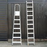An aluminium extending ladder, 500cm high overall,