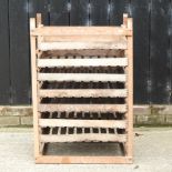 A stack of wooden potato chitting trays,